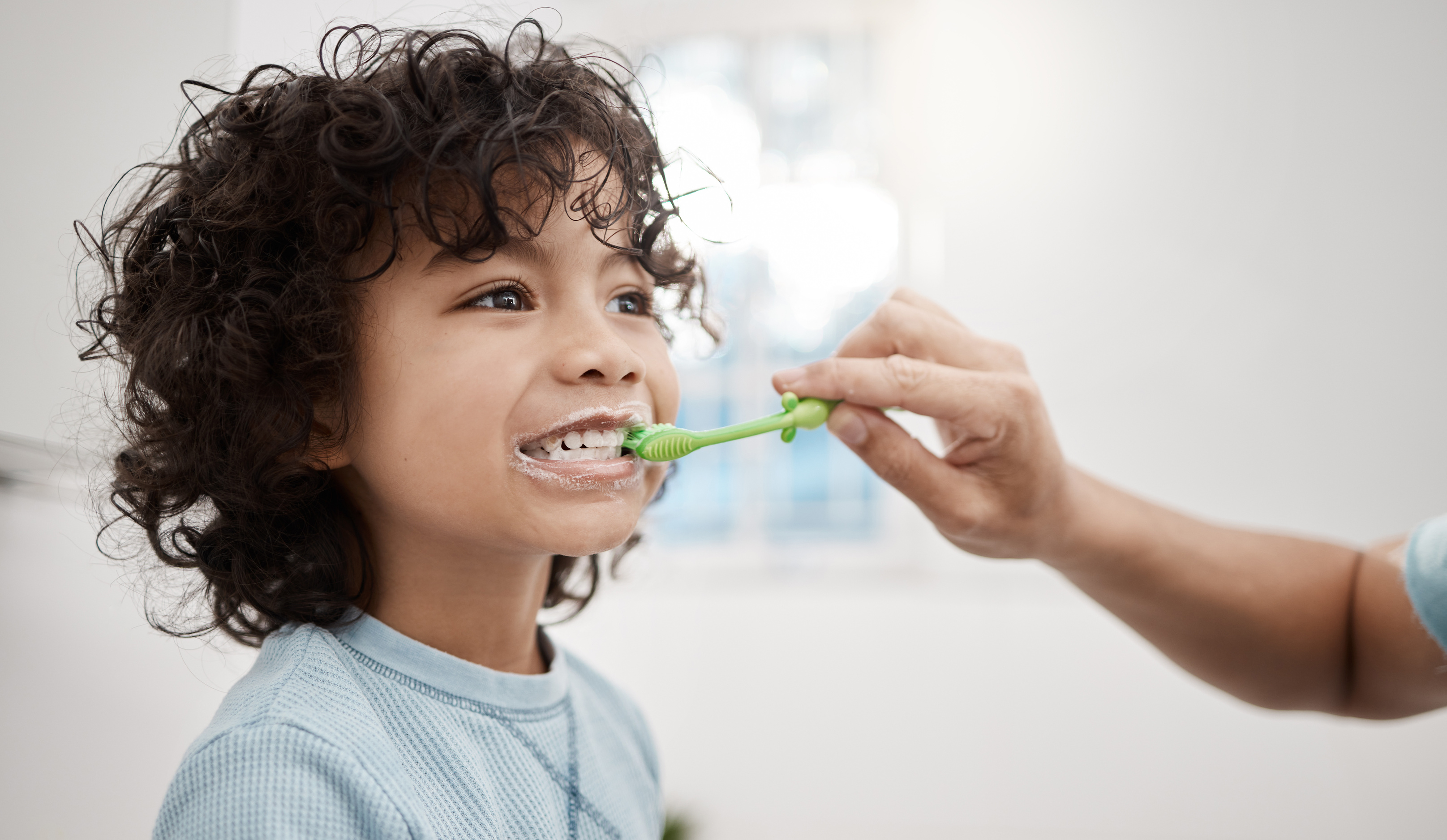 Brushing Your Kids Teeth Properly Helps Prevent Cavities and Inf